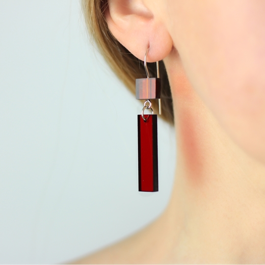 Architect earrings orange and red worn