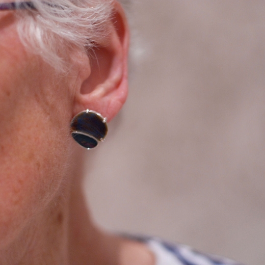 opal earring worn