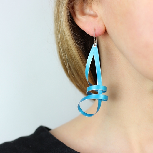 Turquoise long ribbon drop earrings worn