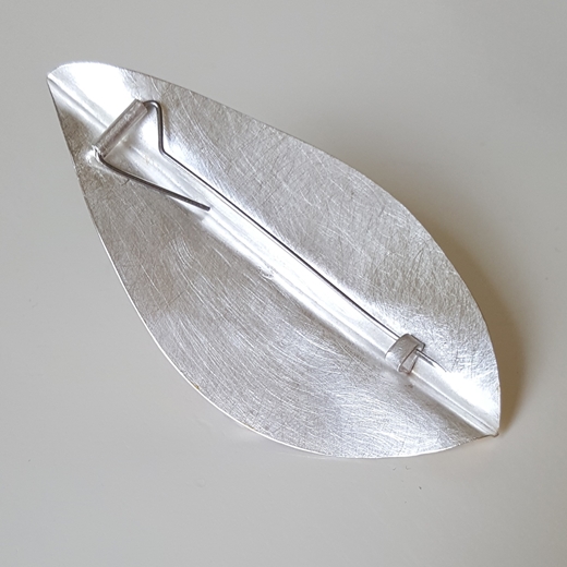 brooch back with single steel pin