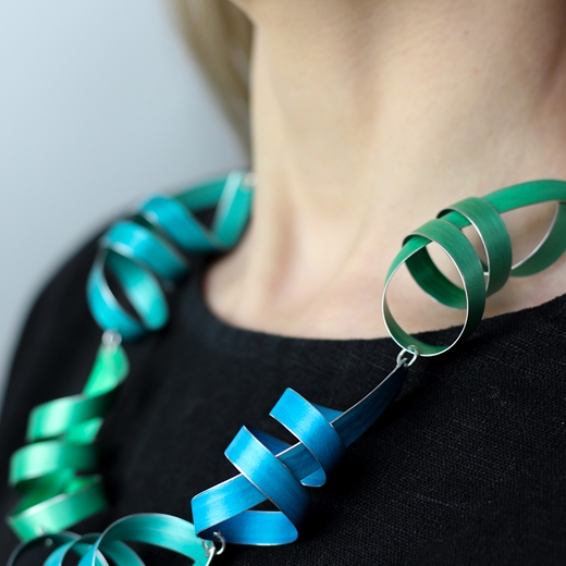 Green, turquoise blue and jade five long ribbon necklace worn detail