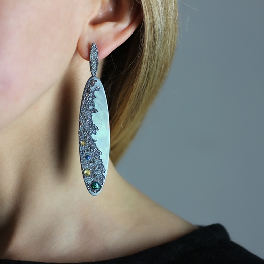 Blue Ocean titanium earrings worn