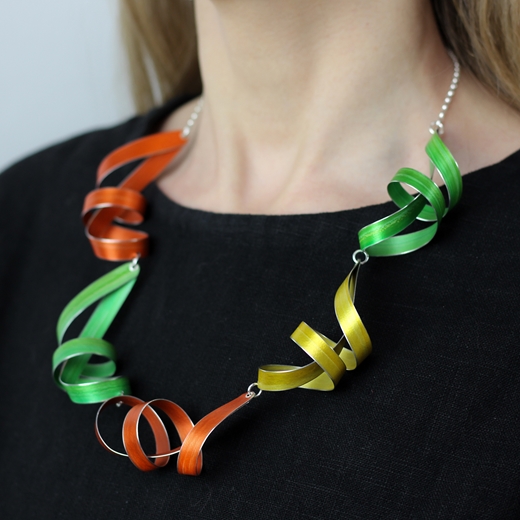 Lime, yellow and orange five long ribbon necklace worn