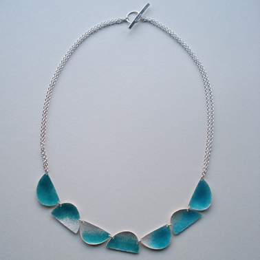 Seven half ovals and chain necklace