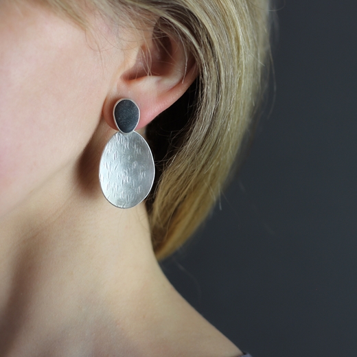 Pebble and textured silver earrings - worn