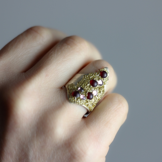 Volcanic treasure red and pink ring worn