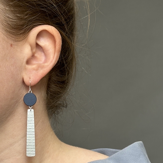 navy earrings shown worn