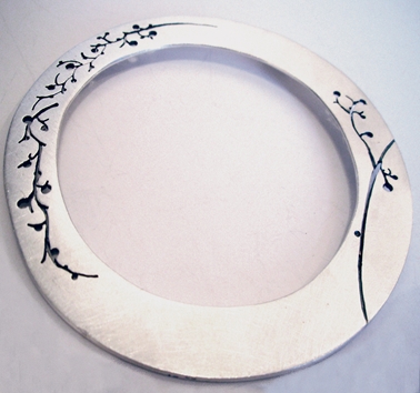 Isis silver washer bangle