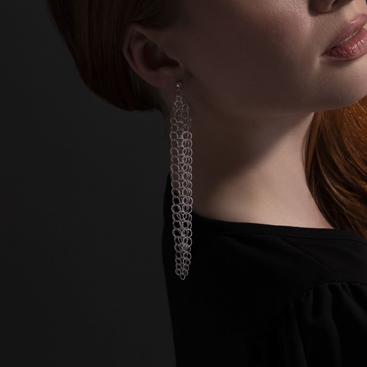 Holme earrings on ear