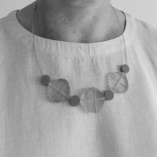 petal dot necklace worn