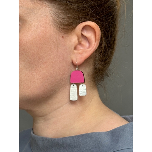 Pink two part stripe earrings worn