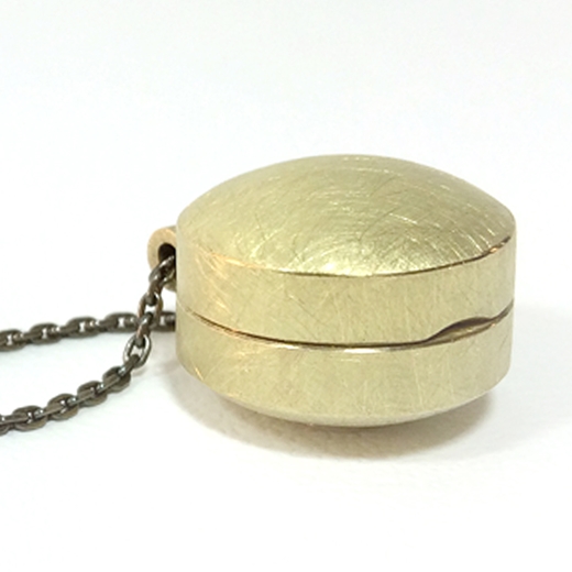 Relic hinged container locket