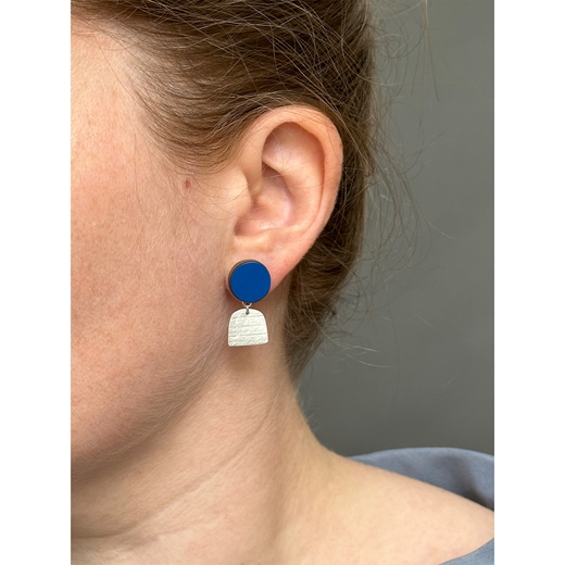 Blue earrings to show scale