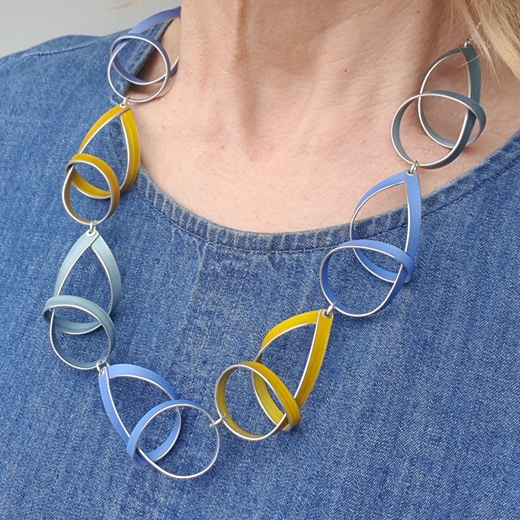 Blue yellow seven short ribbon necklace worn